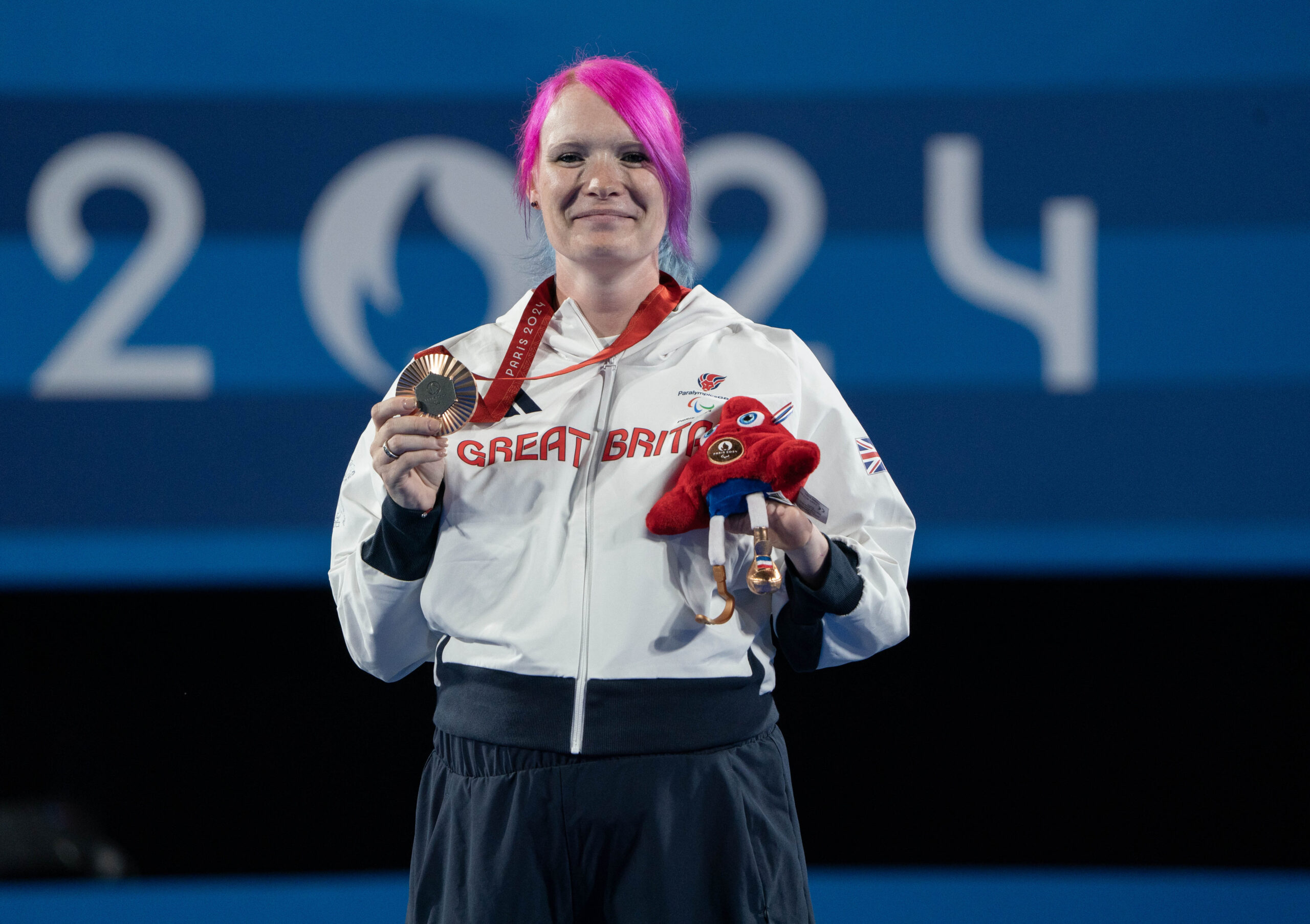 Image credit: imagecomms. ParalympicsGB Archer, Jodie Grinham aged 31, from Haverfordwest, Wales, wins bronze, in the Individual Compound Open - Women event, at the Paris 2024 Paralympic Games.