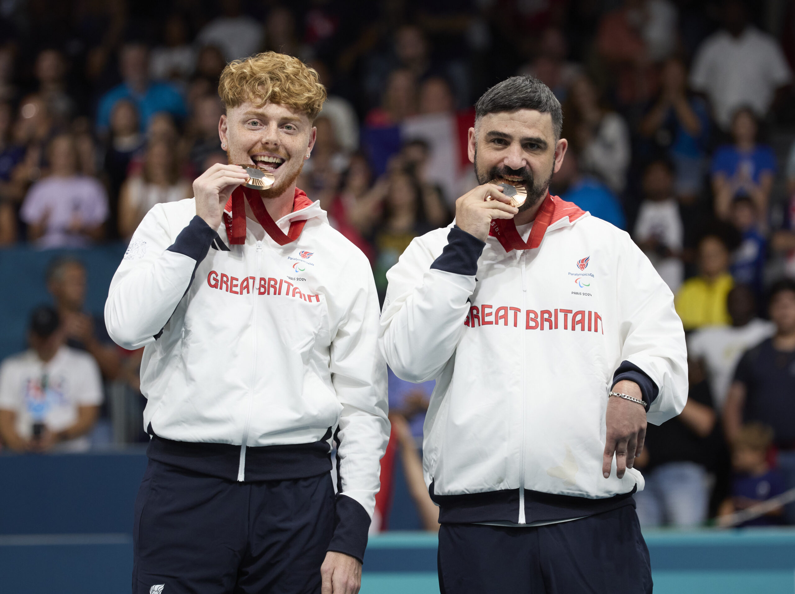 Image credit: imagecomms. ParalympicsGB Table Tennis athletes, Paul Karabardak (right) from Swansea, Wales, Billy Shilton win bronze in the Men's Doubles - MD14 event, at the Paris 2024 Paralympic Games.