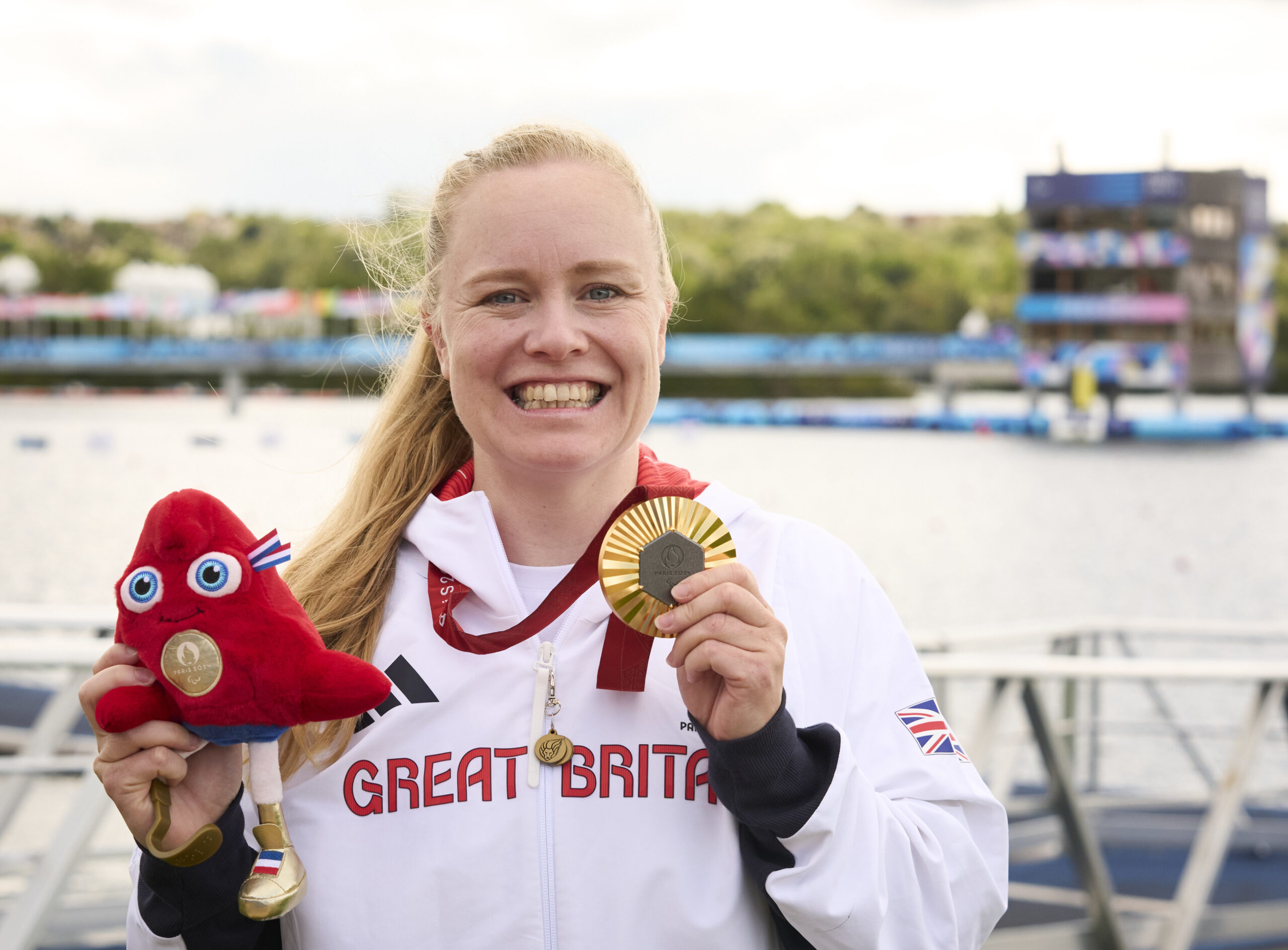 Laura Sugar with her women’s kayak singles KL3 200m gold medal.