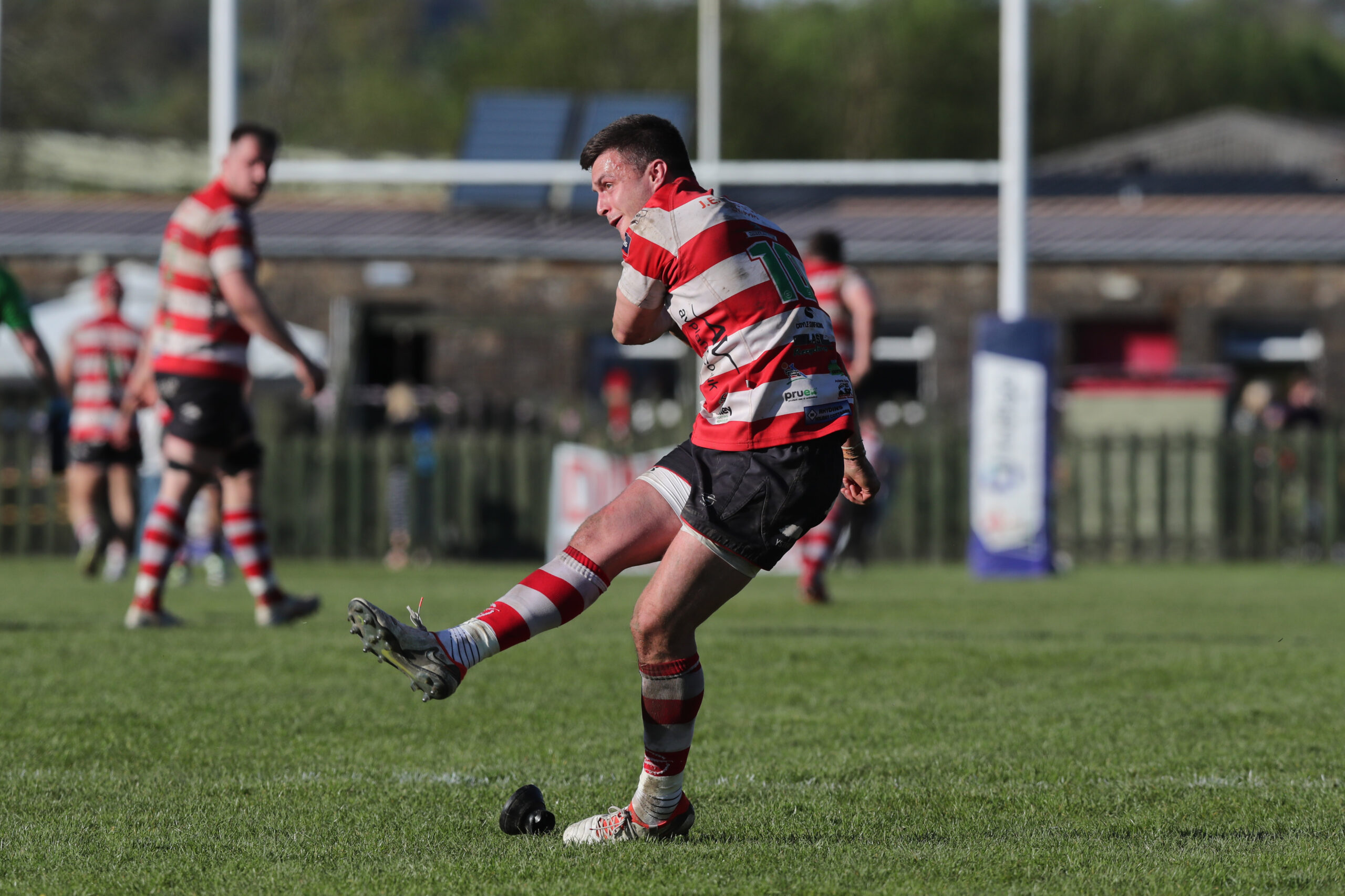 Ioan Hughes of Llandovery kicks for goal