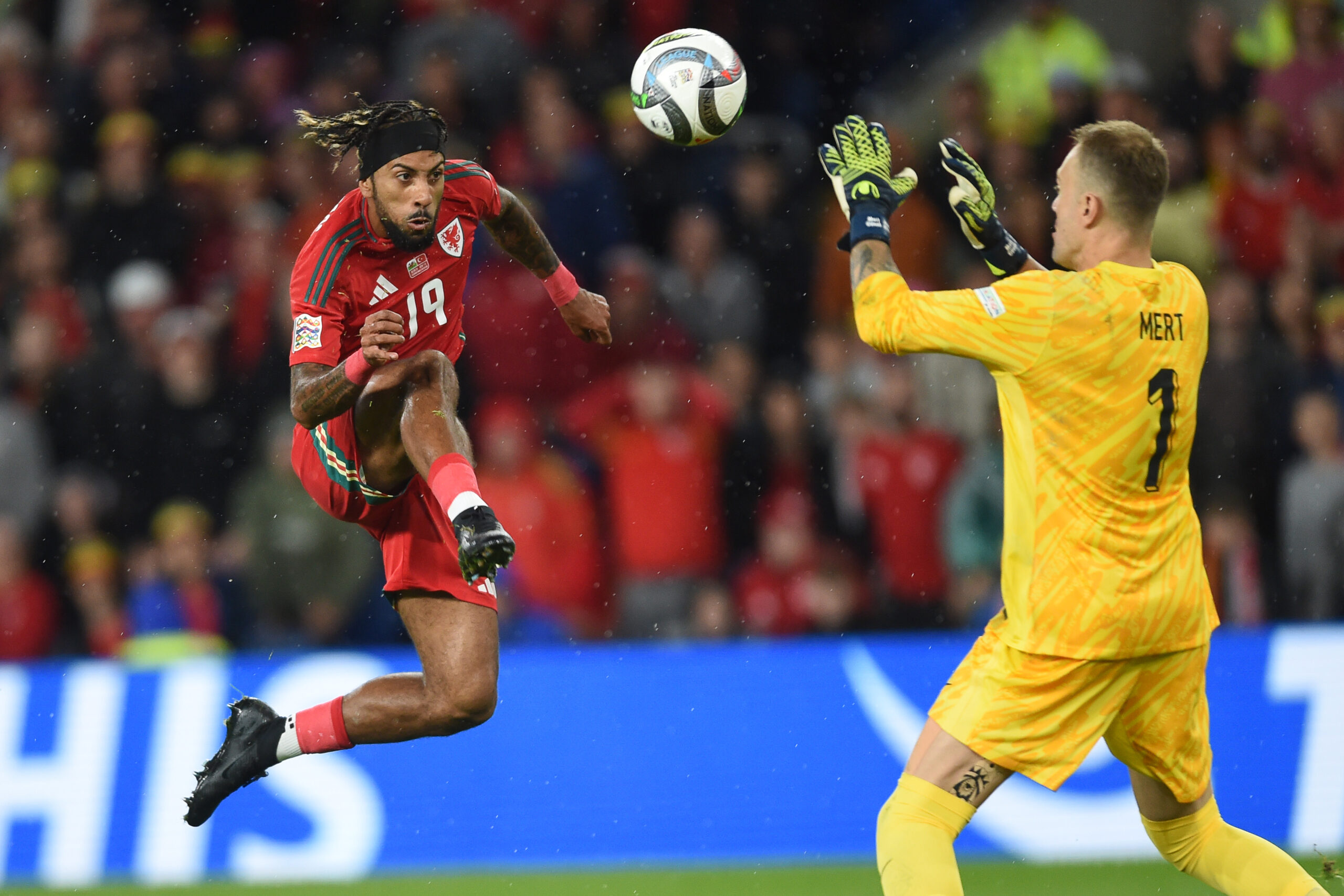 Sorba Thomas of Wales makes the run to scores a goal before it was disallowed by VAR.