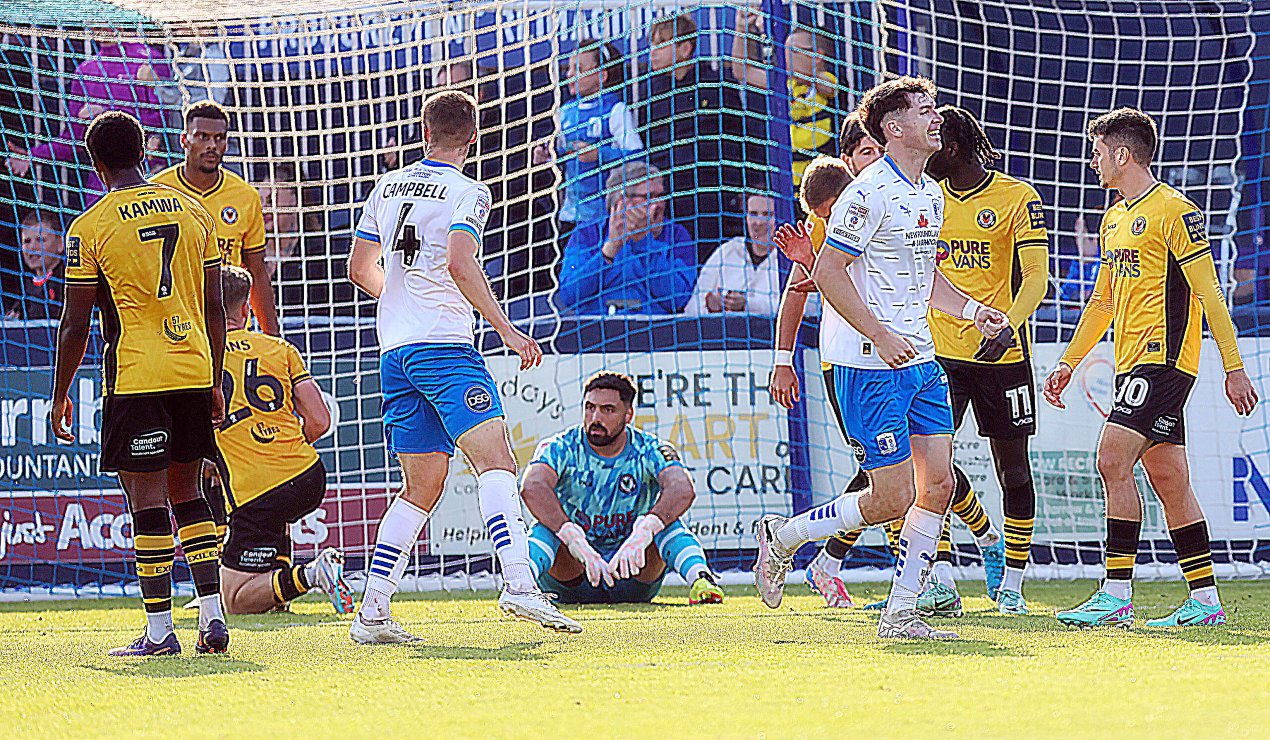 Goalkeeper Nick Townsend of Newport County sits dejected after the 2nd Barrow goal.