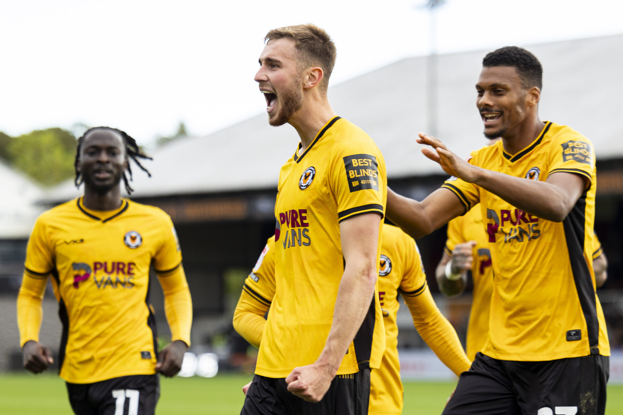 Matthew Baker of Newport County celebrates scoring his sides second goal.