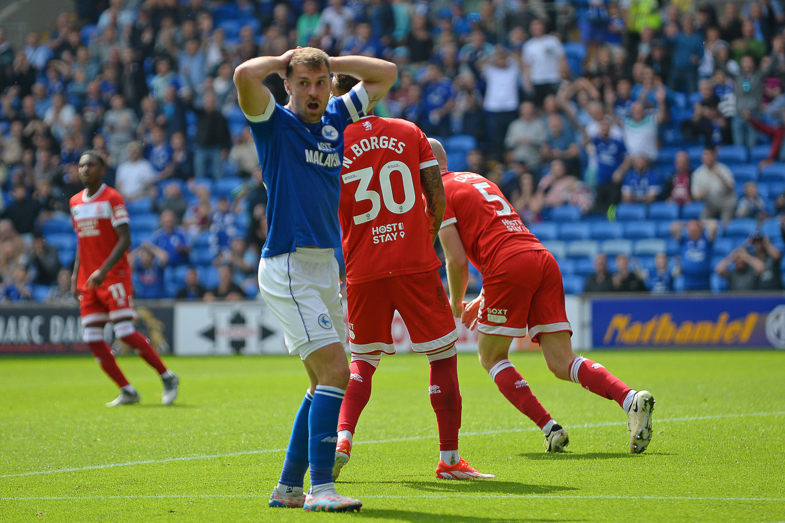 Aaron Ramsey of Cardiff City has a shot at goal