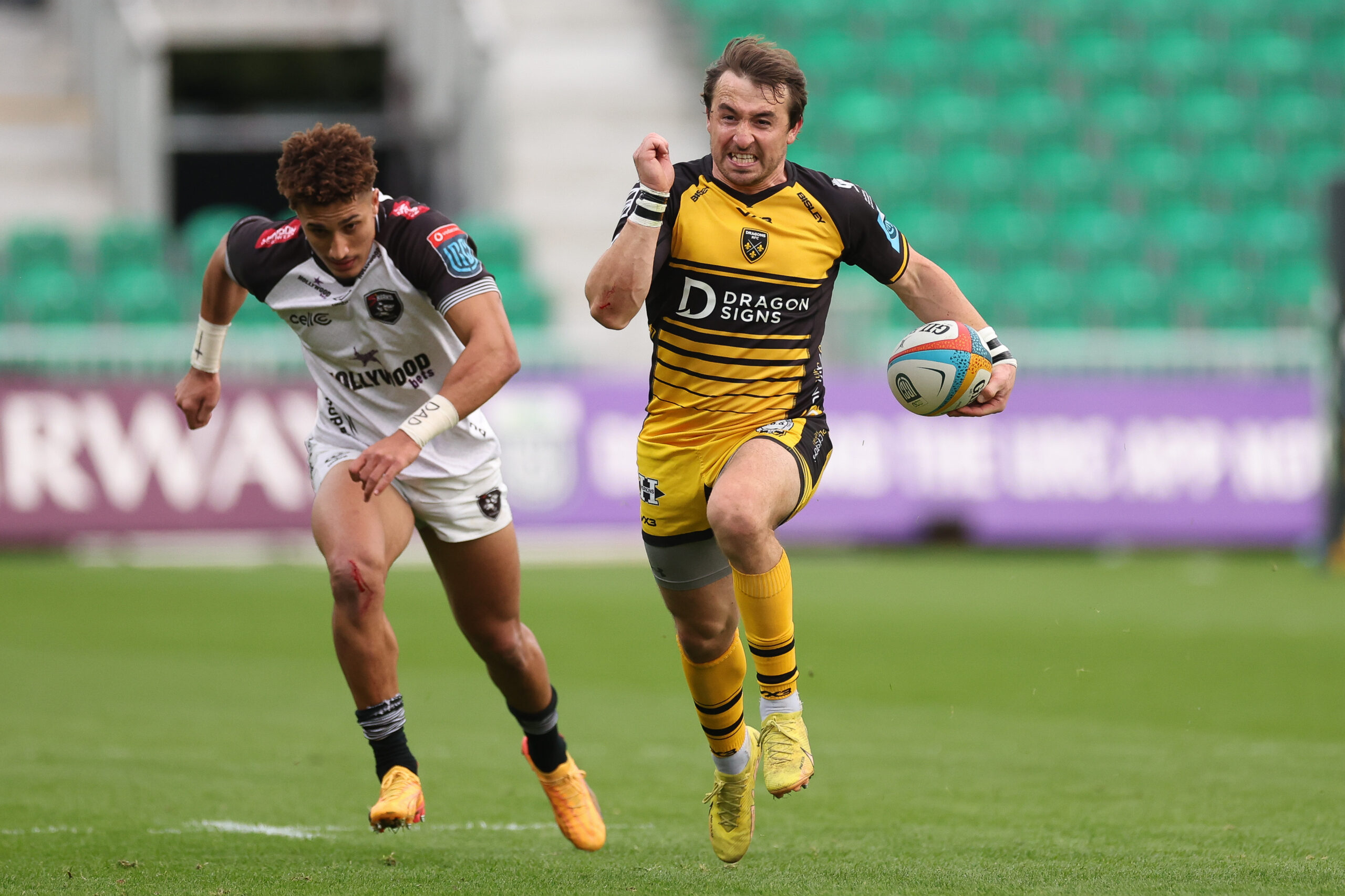 05.10.24 Dragons RFC v Hollywoodbets Sharks, United Rugby Championship - Rhodri Williams of Dragons races away