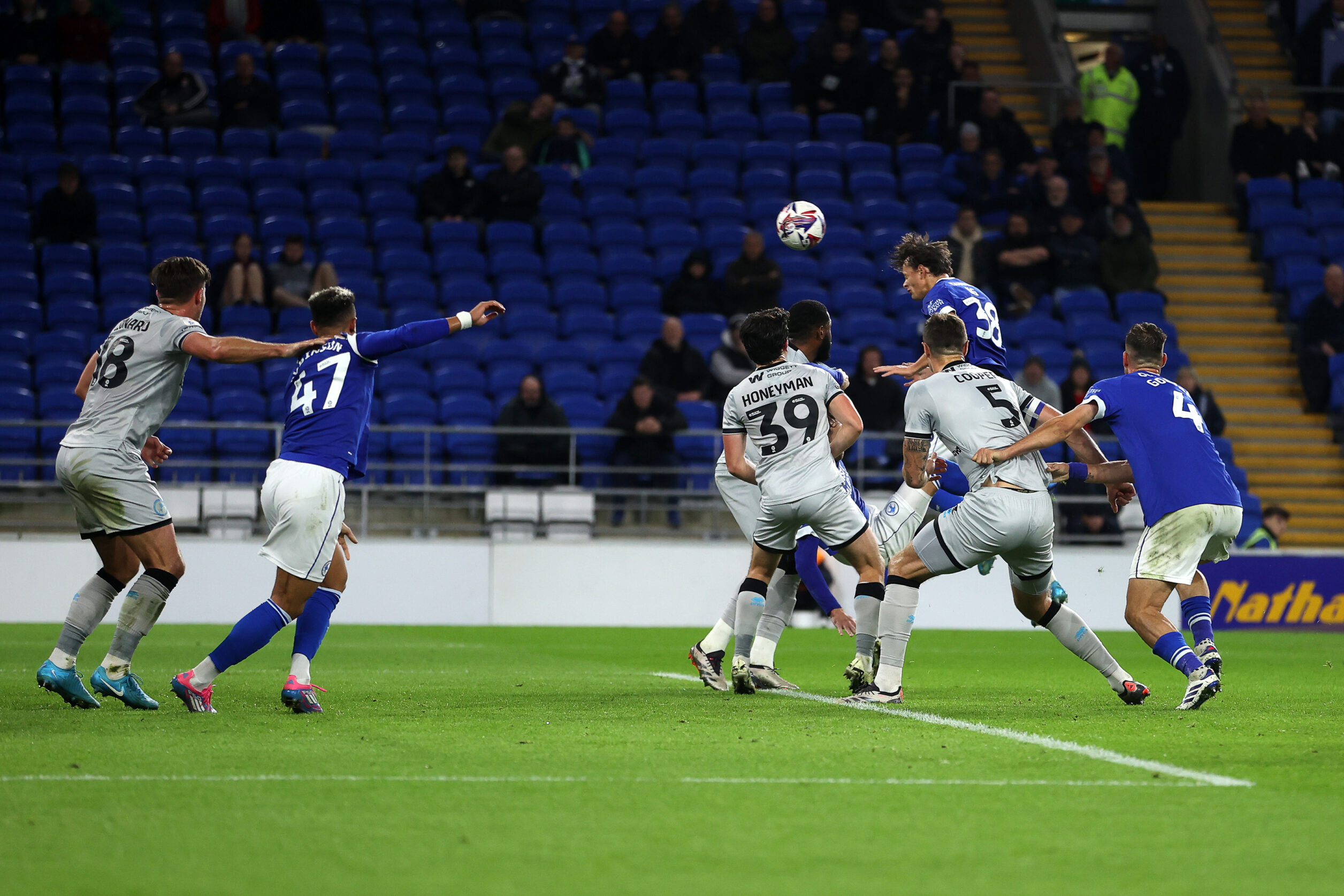 01.10.24 - Cardiff City v Millwall, SkyBet Championship - Perry Ng of Cardiff City headers the ball in to score the first goal.