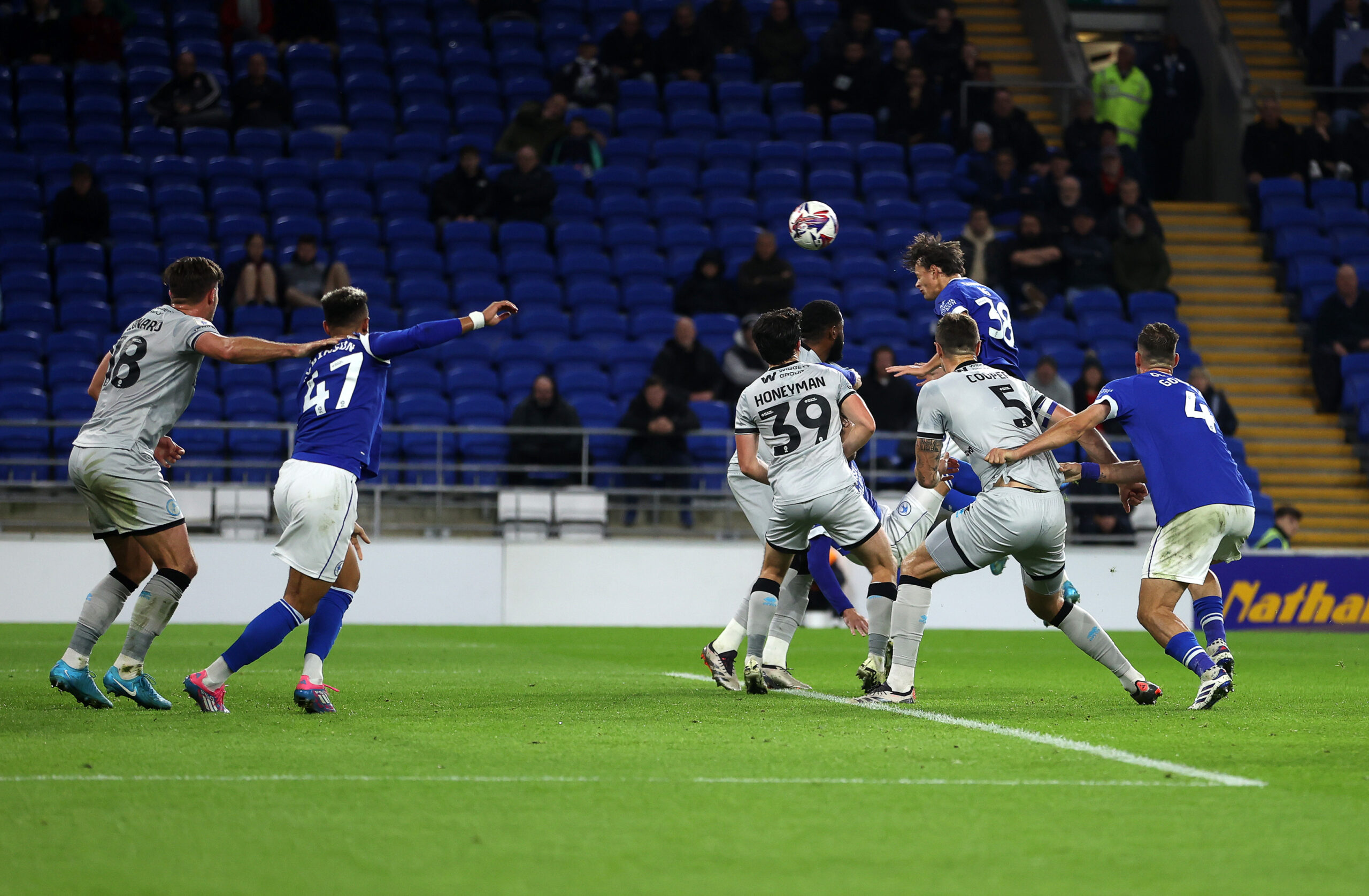 01.10.24 - Cardiff City v Millwall, SkyBet Championship - Perry Ng of Cardiff City headers the ball in to score the first goal.