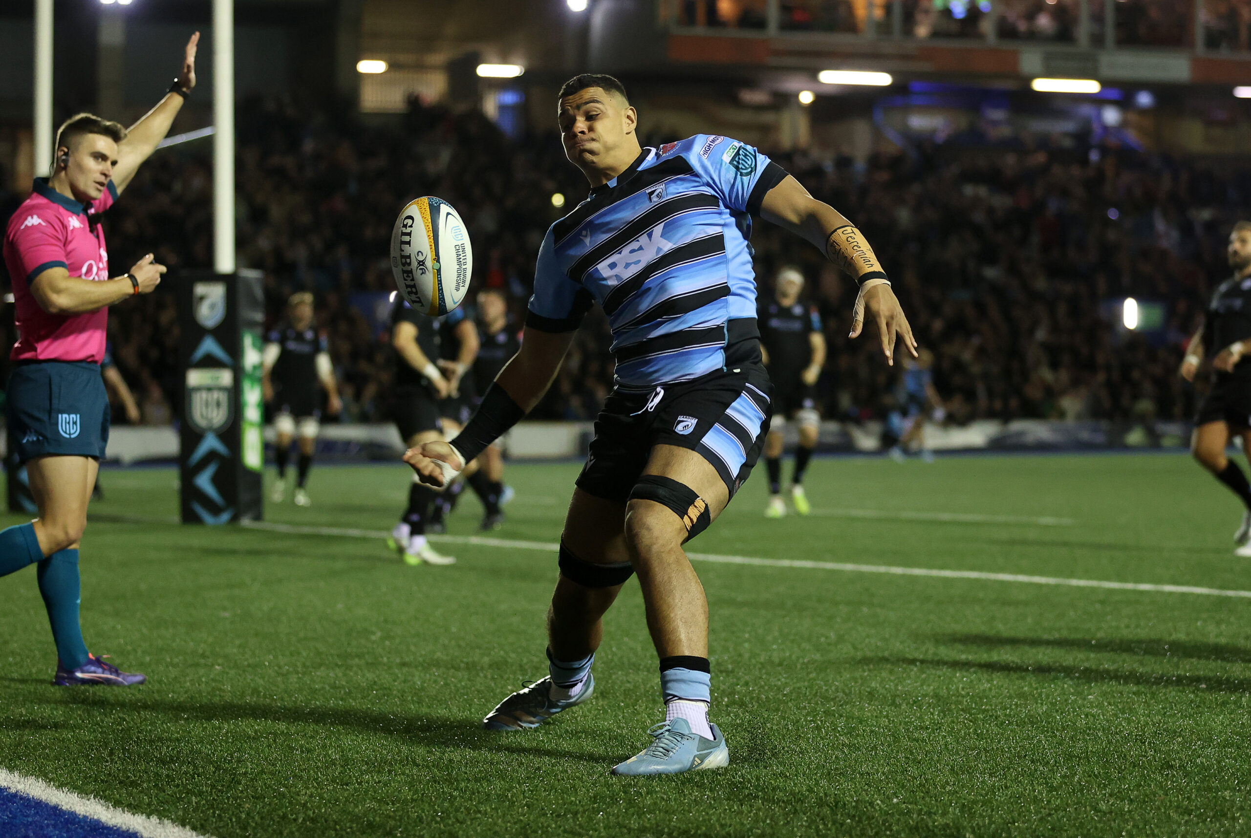 Mackenzie Martin of Cardiff celebrates scoring a try.