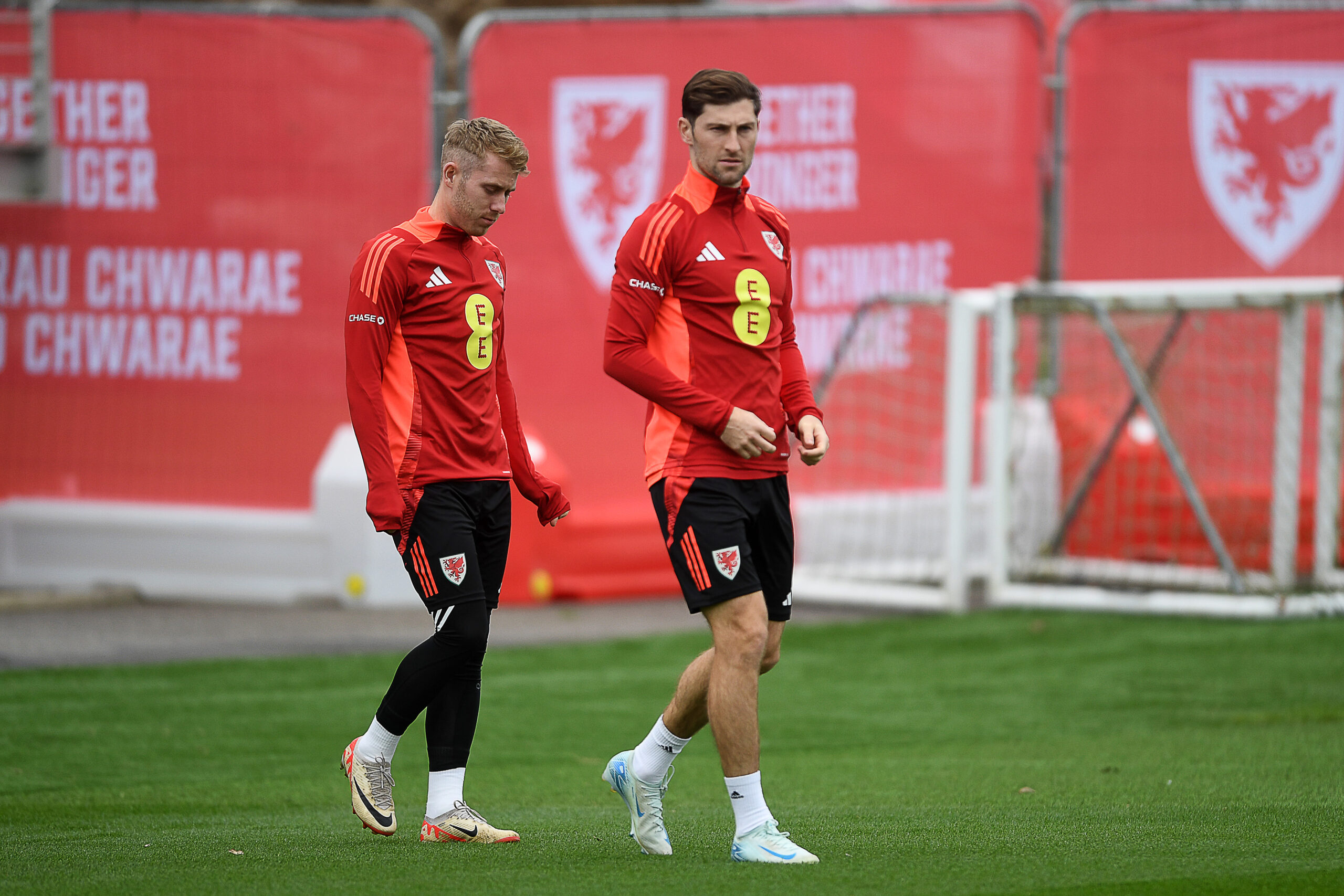 Ben Davies and Ollie Cooper of Wales during training ahead of their UEFA Nations league match against Montenegro.