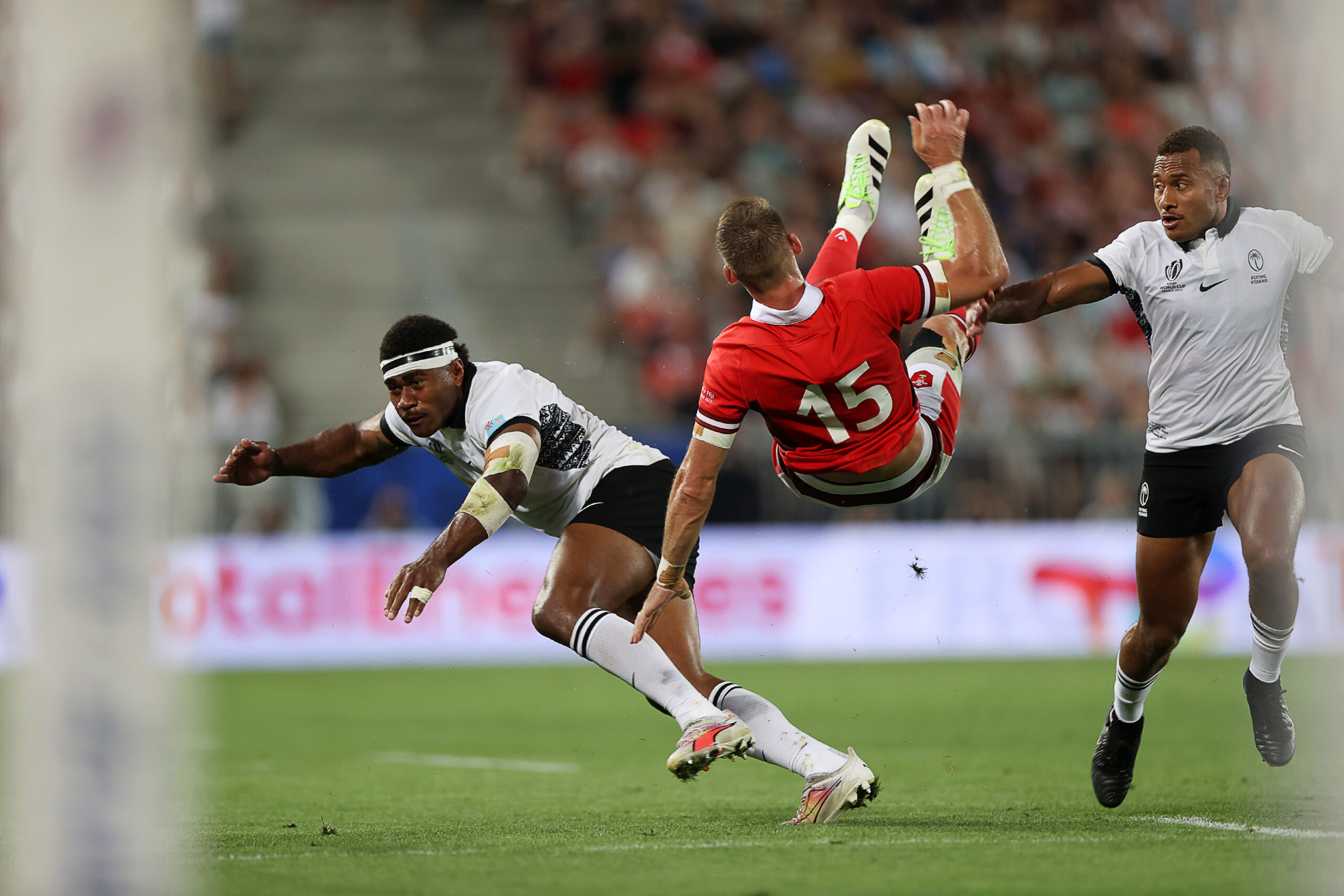 10.09.23 - Wales v Fiji - Rugby World Cup 2023 - Pool C - Liam Williams of Wales is tackled by Vinaya Habosi of Fiji