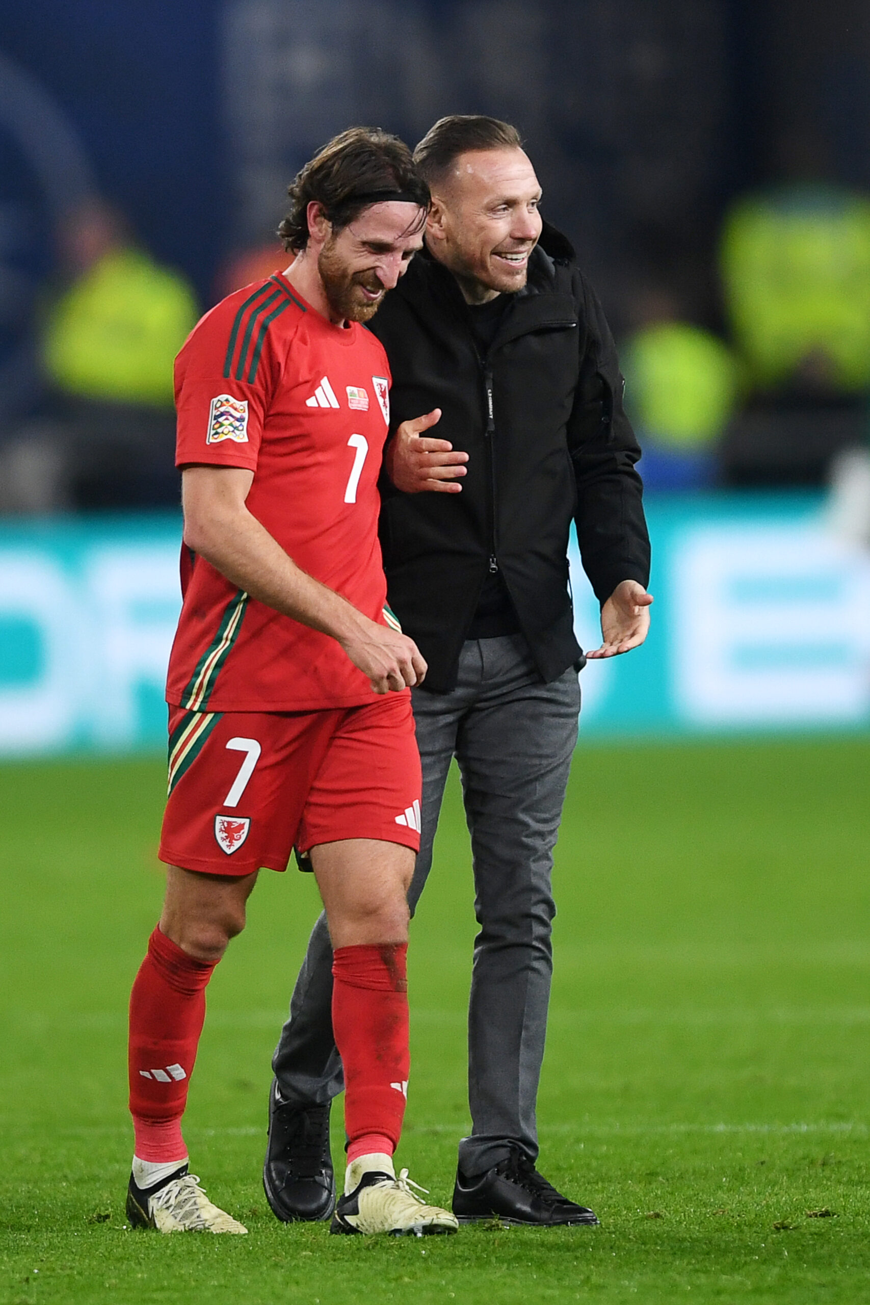 14.10.24 - Wales v Montenegro - UEFA Nations League - Joe Allen of Wales and Craig Bellamy, Wales Manager celebrate the win at full time